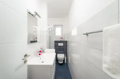 Kupaonica u objektu Azalea Apartments