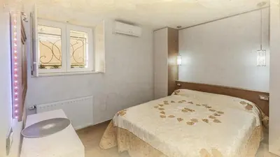 Krevet ili kreveti u jedinici u objektu Apartments by the sea Brela, Makarska - 20708