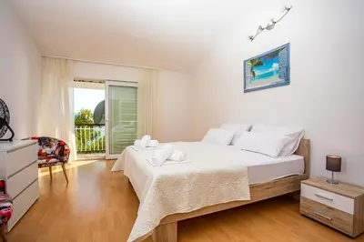 Krevet ili kreveti u jedinici u objektu Apartments Adisa