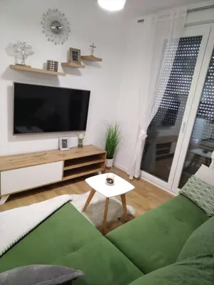 TV i/ili zabavni centar u objektu Relax