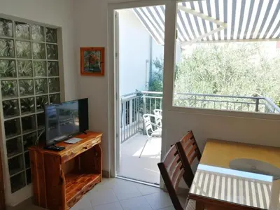 TV i/ili zabavni centar u objektu Apartment in Duce with balcony, air conditioning, WiFi 5146-7