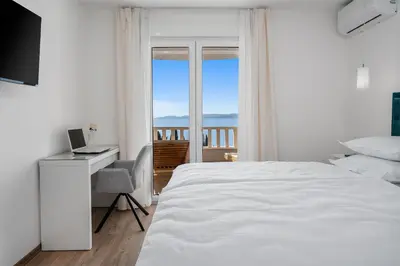 Krevet ili kreveti u jedinici u objektu Apartmani Marko