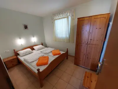 Krevet ili kreveti u jedinici u objektu Flora Apartman Sutivan