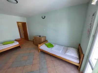 Krevet ili kreveti u jedinici u objektu Flora Apartman Sutivan