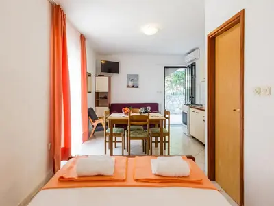 Krevet ili kreveti u jedinici u objektu Apartments Villa Pelegrin
