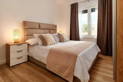 Krevet ili kreveti u jedinici u objektu Villa Stella, private pool, sleeps 12, Dugi Rat