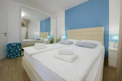 Krevet ili kreveti u jedinici u objektu Serviced Family Suite by the sea, Mezaninе lеvеl