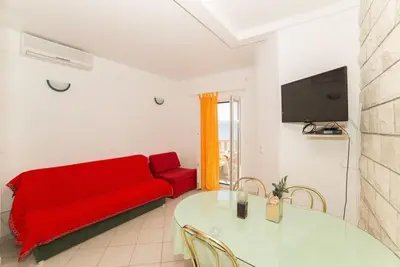 TV i/ili zabavni centar u objektu Apartments and Room Jure