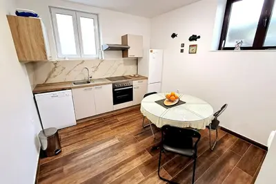Kuhinja ili čajna kuhinja u objektu Apartment by the sea SONJA