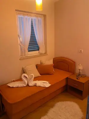 Krevet ili kreveti u jedinici u objektu Apartmani PENAVIĆ